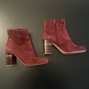 Suede maroon heeled boots with gold accents. Size 6.5.